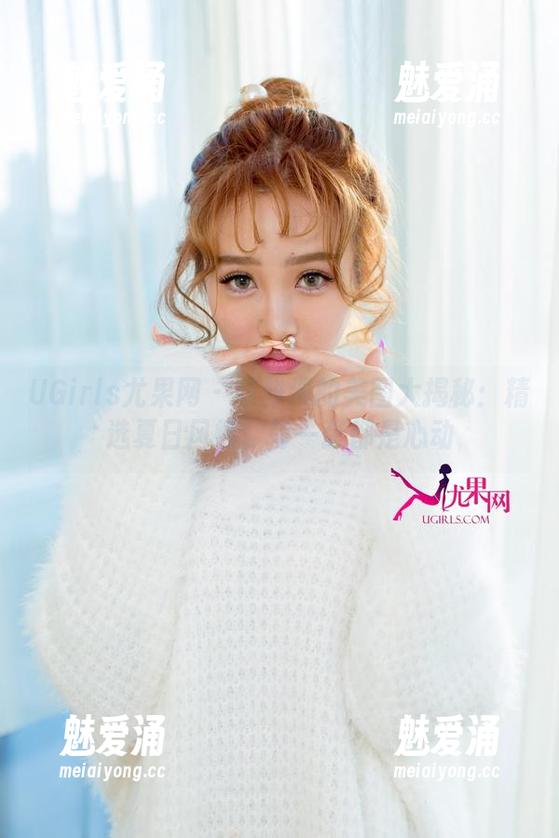 UGirls尤果网 - 陈雅漫的美图大揭秘：精选夏日风情，每一张都是心动